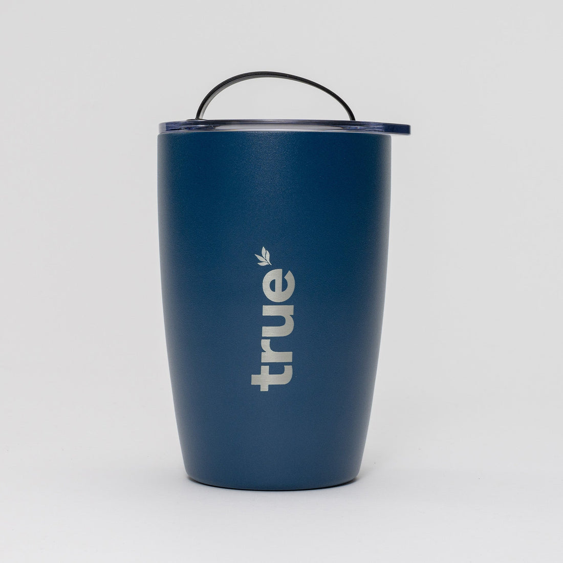 Navy blue insulated stainless-steel travel coffee tumbler with clear lid and handle, vertical "true" logo — reusable commuter coffee cup.